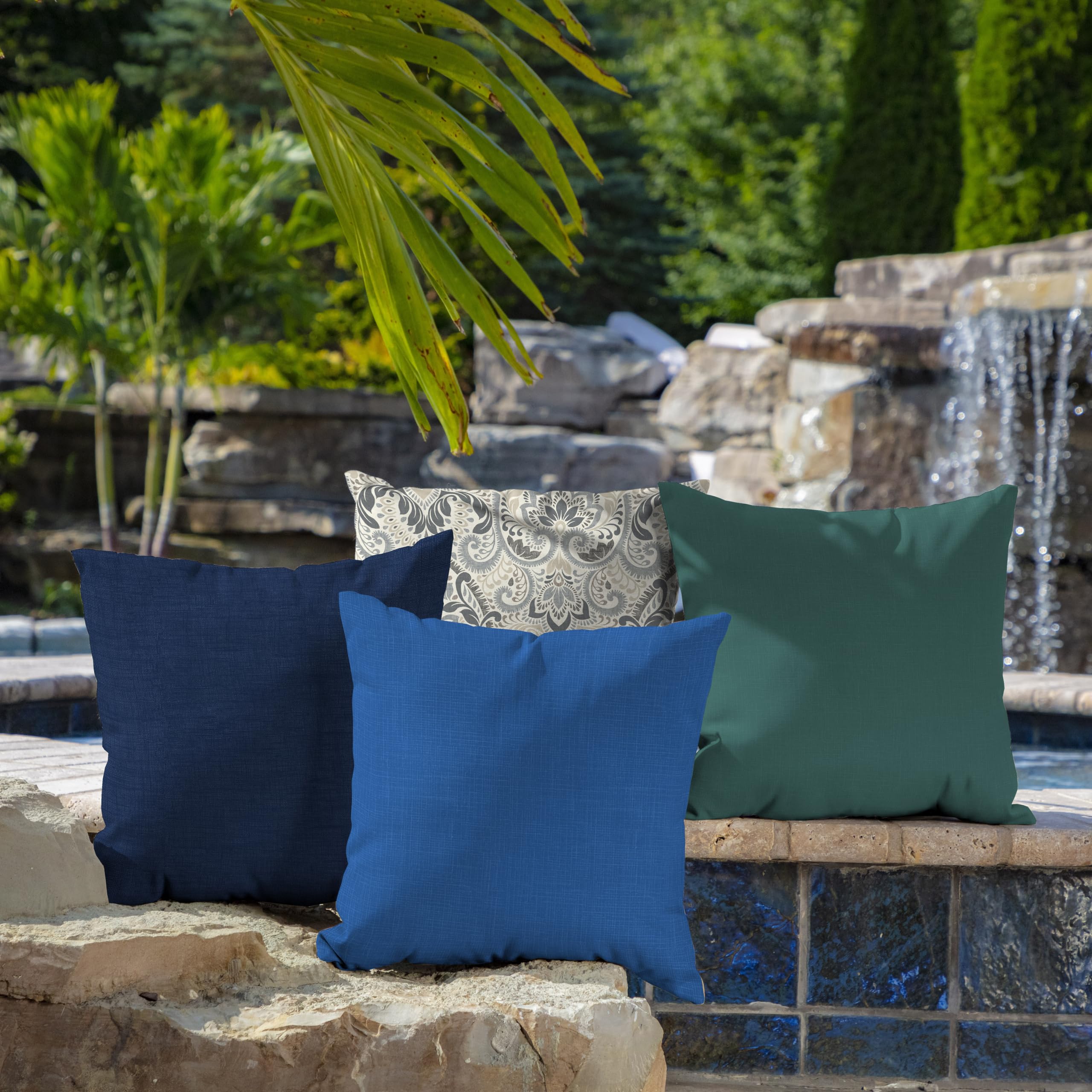 Arden Selections pillow on chair showing 16x16 scale for correct sizing