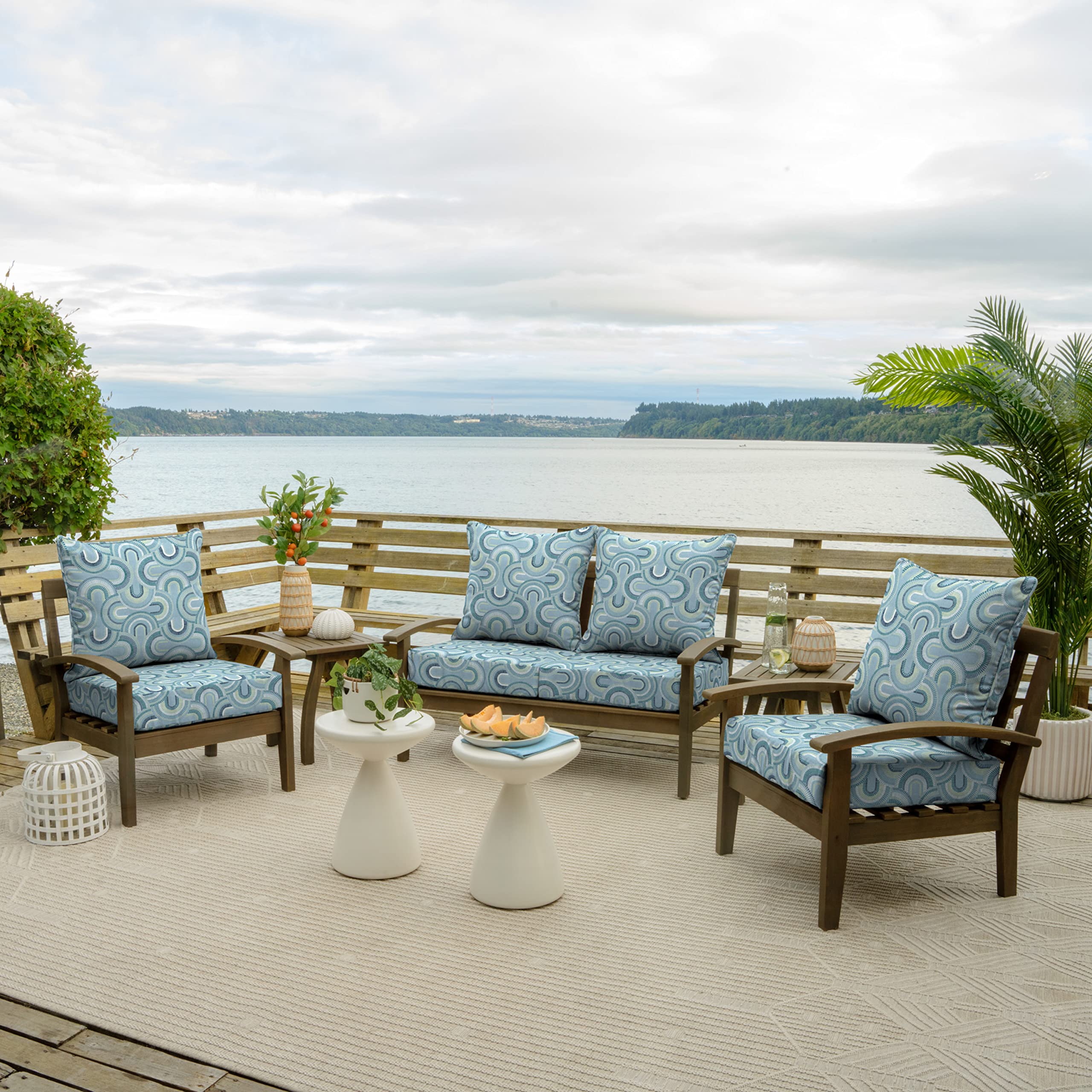 Arden Selections cushion on chair demonstrating 24x24 scale and proper fit on deep seats