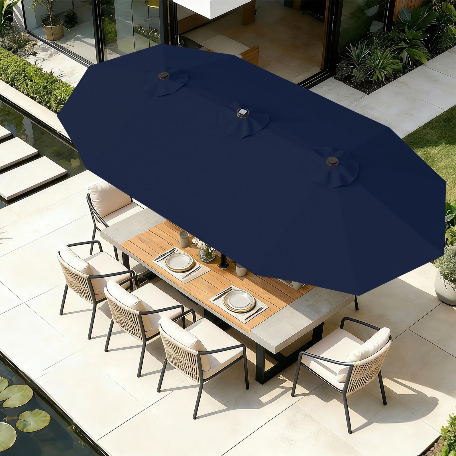 AreShark illuminated umbrella at night creating warm backyard ambiance