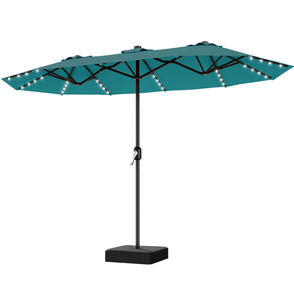 AreShark patio scene at dusk with umbrella lit providing warm atmosphere for outdoor gatherings