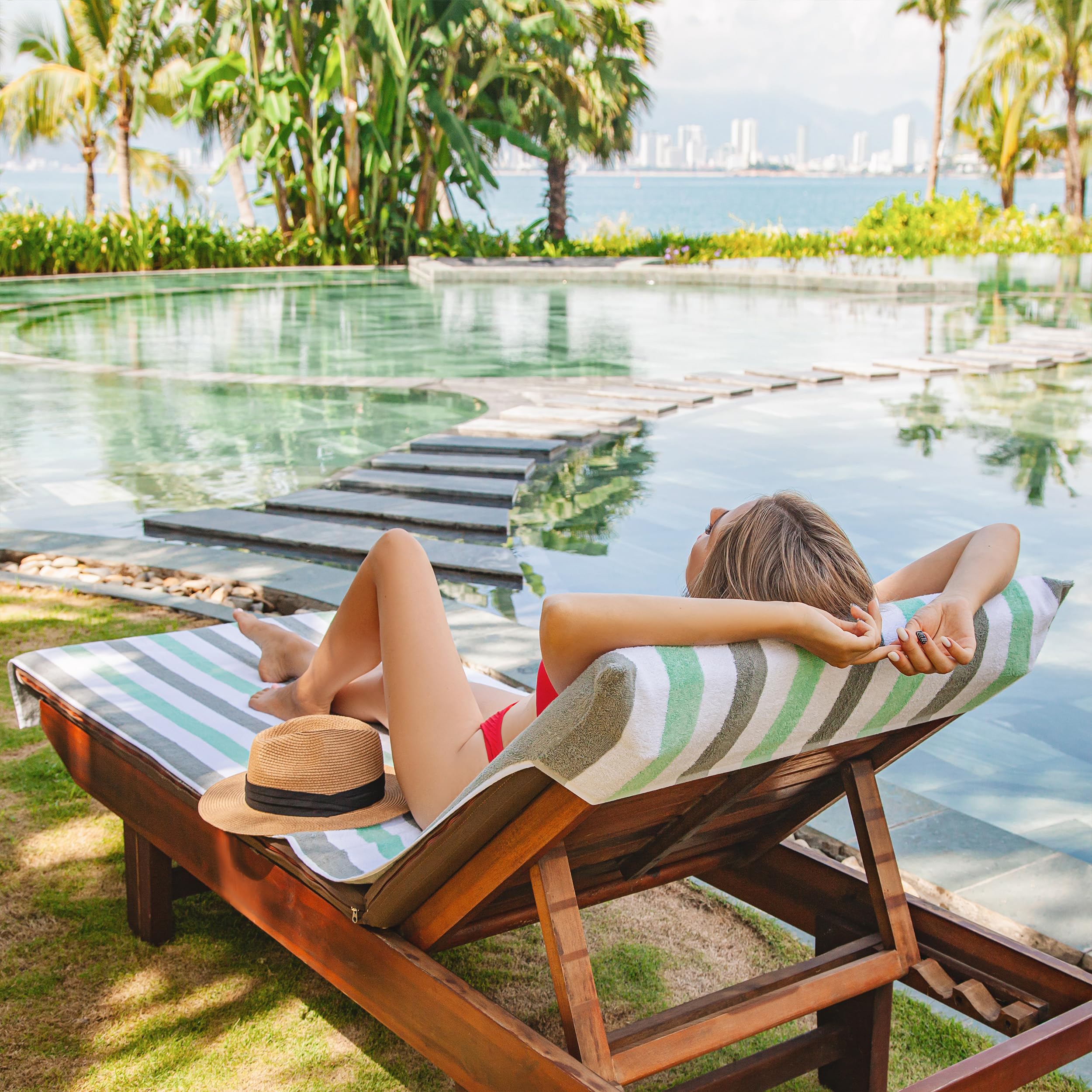 Arkwright Cabo cover draped poolside with person relaxing showing style benefit
