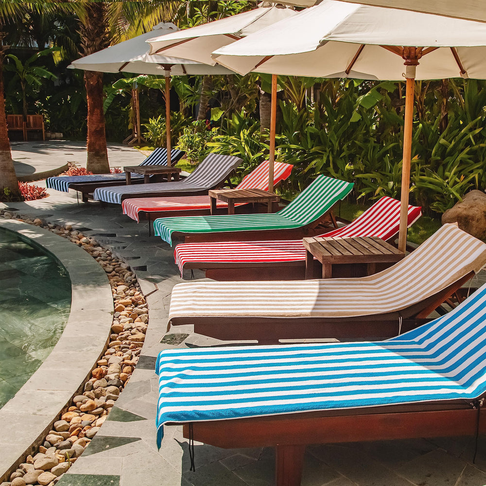 Arkwright lifestyle shot on backyard lounger showing resort-ready look and easy outdoor styling