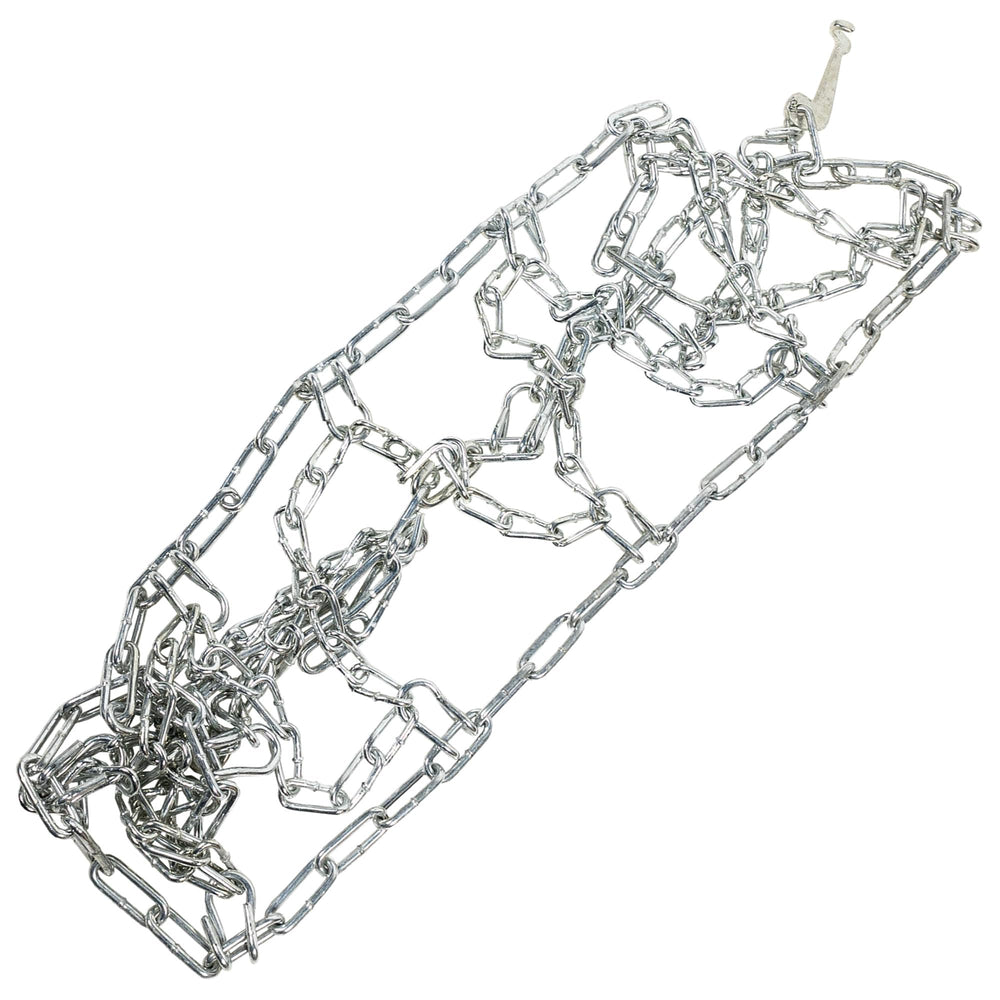 Arnold tire with chains mounted demonstrating improved traction on packed snow