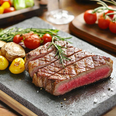 Artestia sizzling steak on stone demonstrating interactive cooking benefit