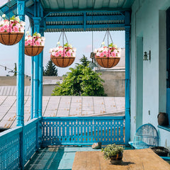 ArtFamy hanging baskets on porch rail showing attractive outdoor display
