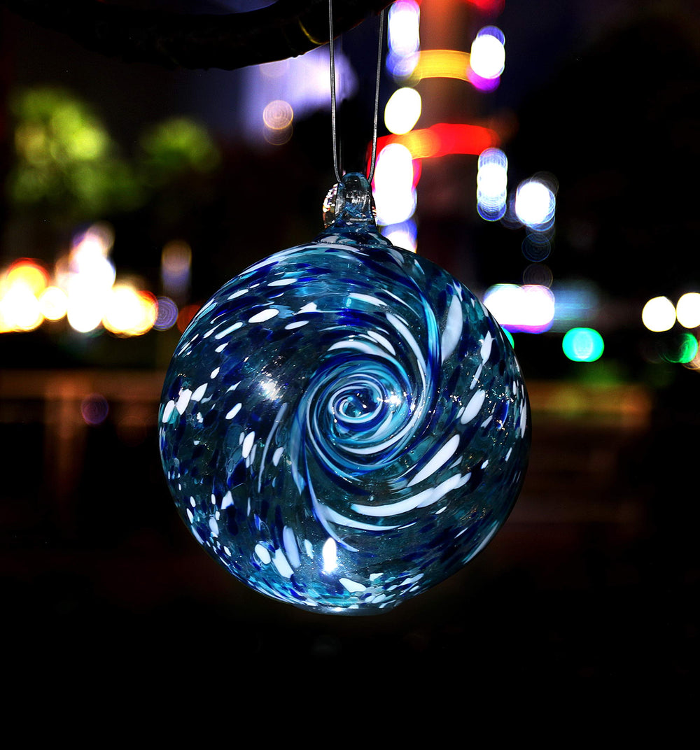 Artisan Crafts and Design front view aqua-blue gazing ball showing decorative glow