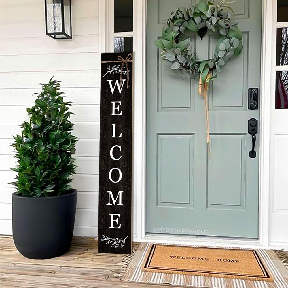 ARTUFAN lifestyle porch scene showing sign styled with plants for seasonal appeal