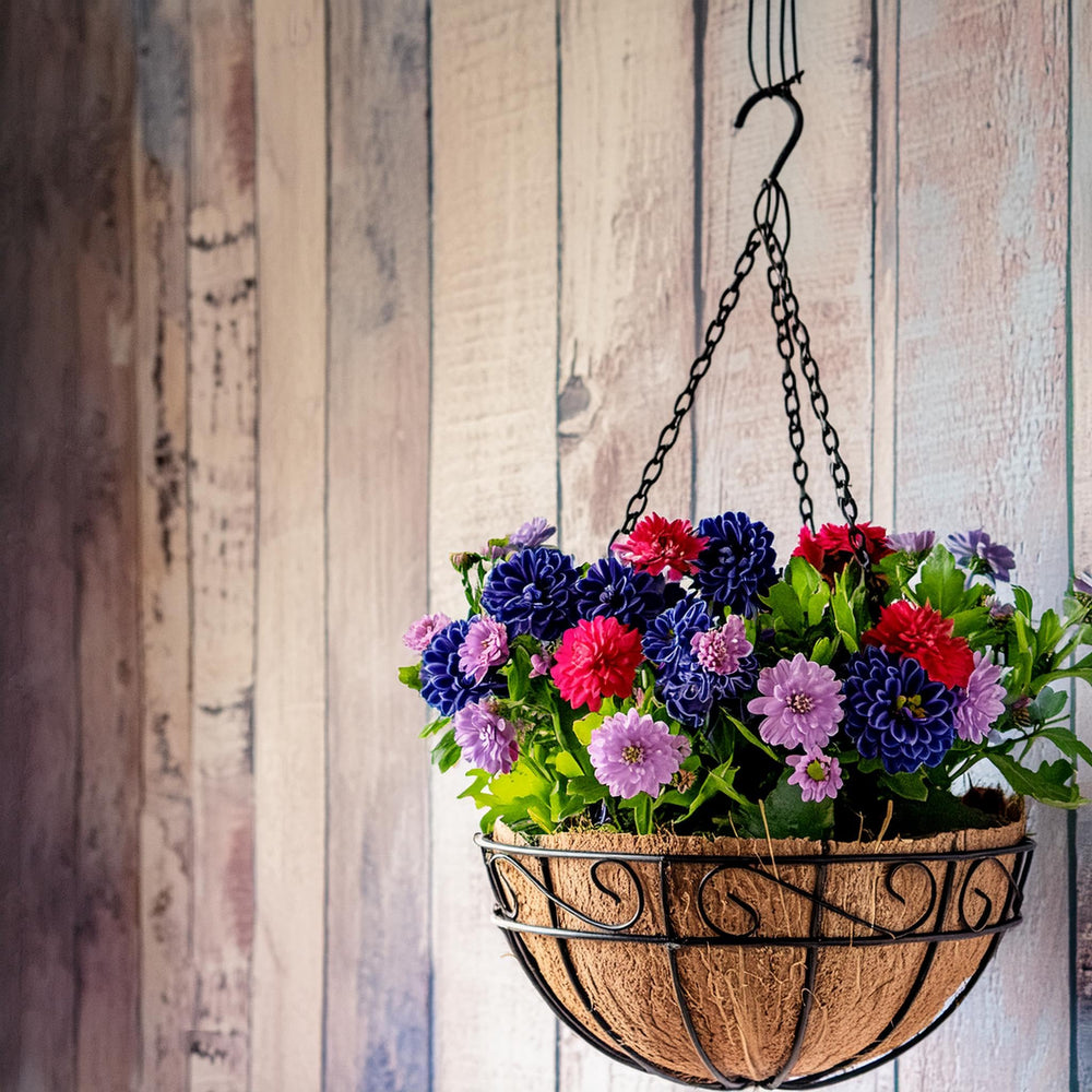 Ashman basket held in hand showing 14-inch scale and easy handling benefit
