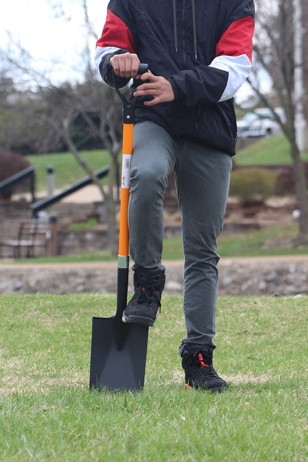ashman spade placed in garden bed showing reliable tool for landscaping tasks