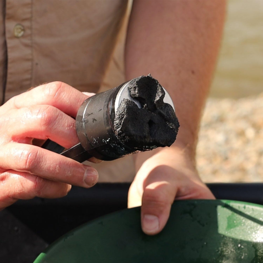 ASR Outdoor black sand magnet and tweezers showing precise separation benefit