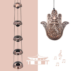 ASTARIN close-up of Hand of God medallion detail highlighting artisanal finish