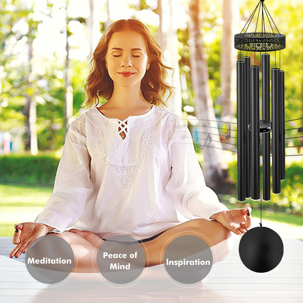 ASTARIN wind chimes in garden demonstrating peaceful atmosphere and outdoor use