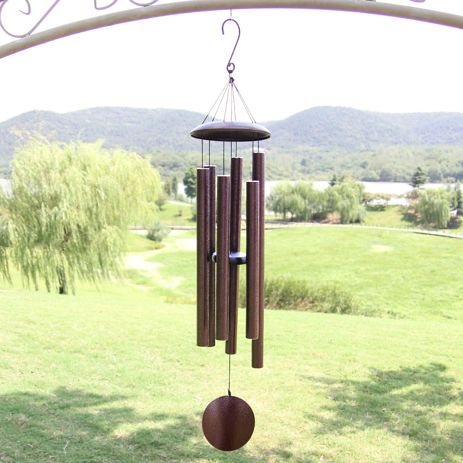 ASTARIN wind chimes in garden setting providing reflective décor and peaceful melodies
