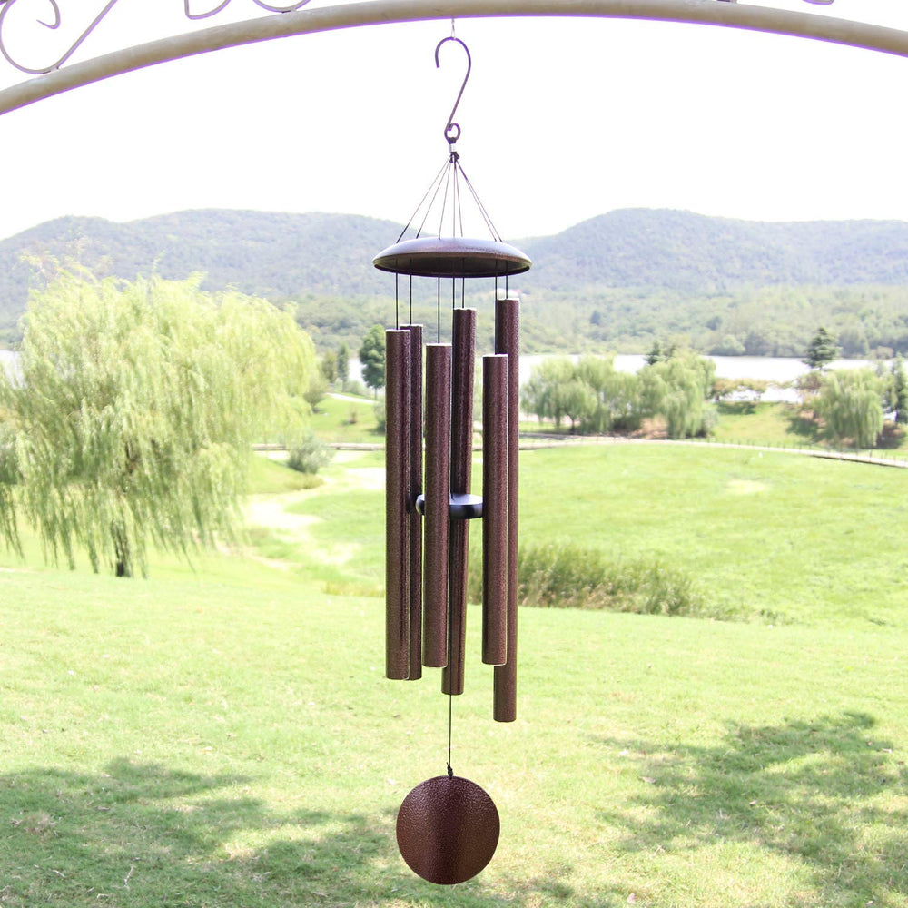 ASTARIN wind chimes in garden setting providing reflective décor and peaceful melodies