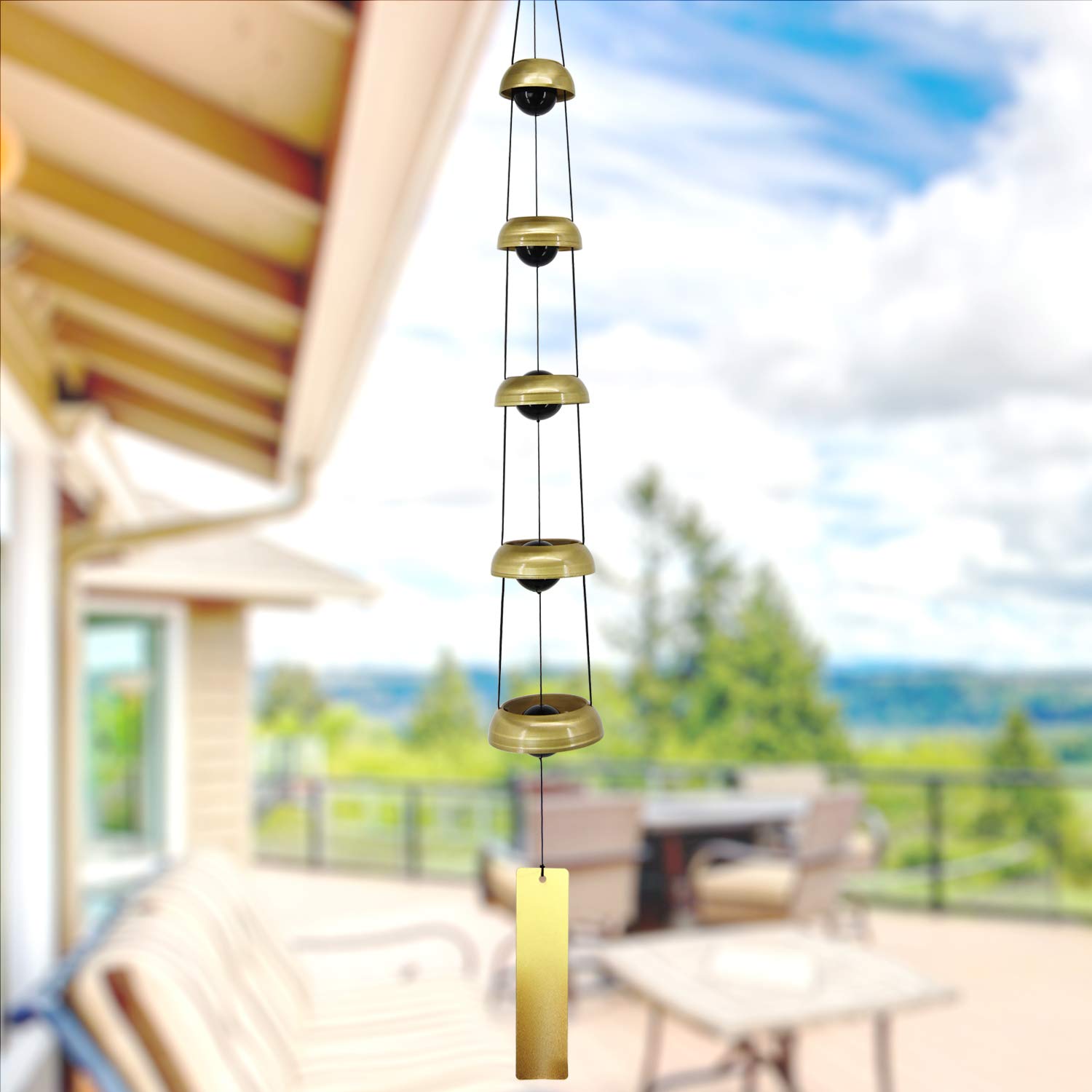 ASTARIN wind chime held in hand for scale illustrating 26-inch length and placement guidance