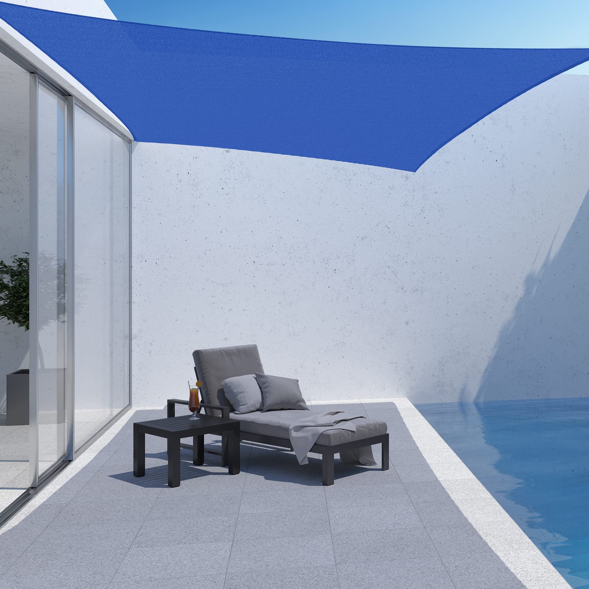 AsterOutdoor shade sail installed over patio creating comfortable outdoor space