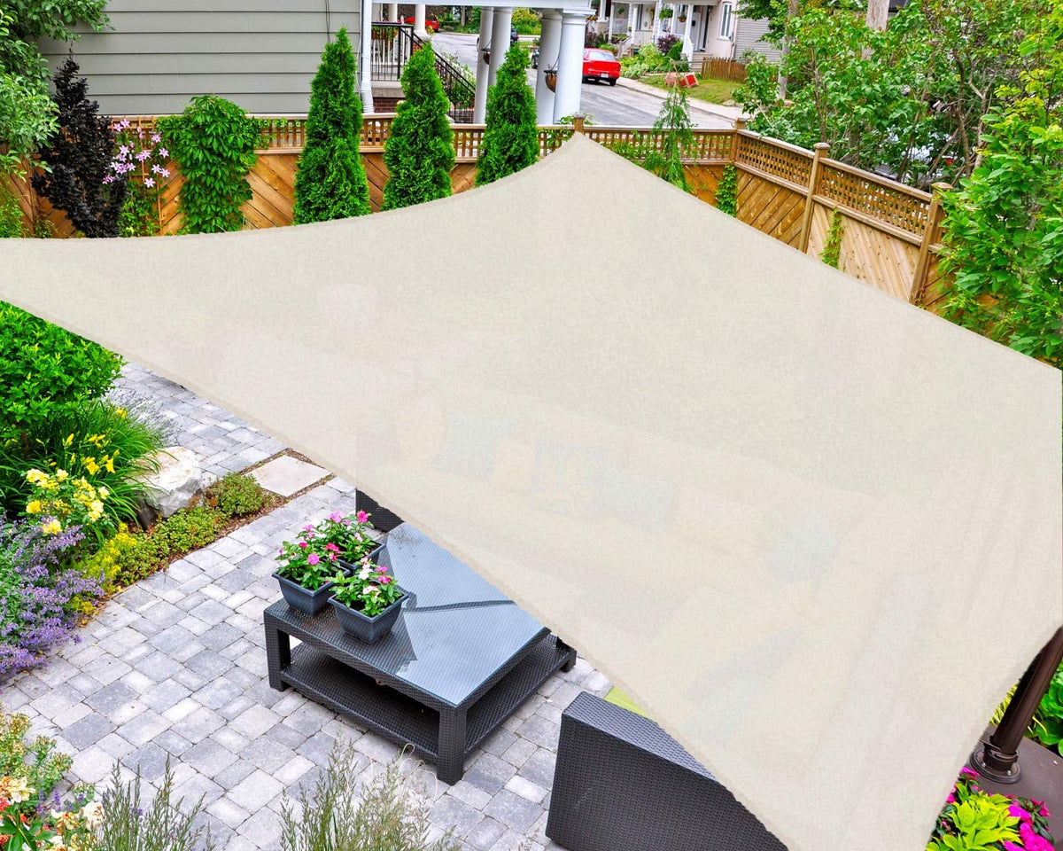 AsterOutdoor front view of cream 16x20 shade sail showing full coverage and curb appeal