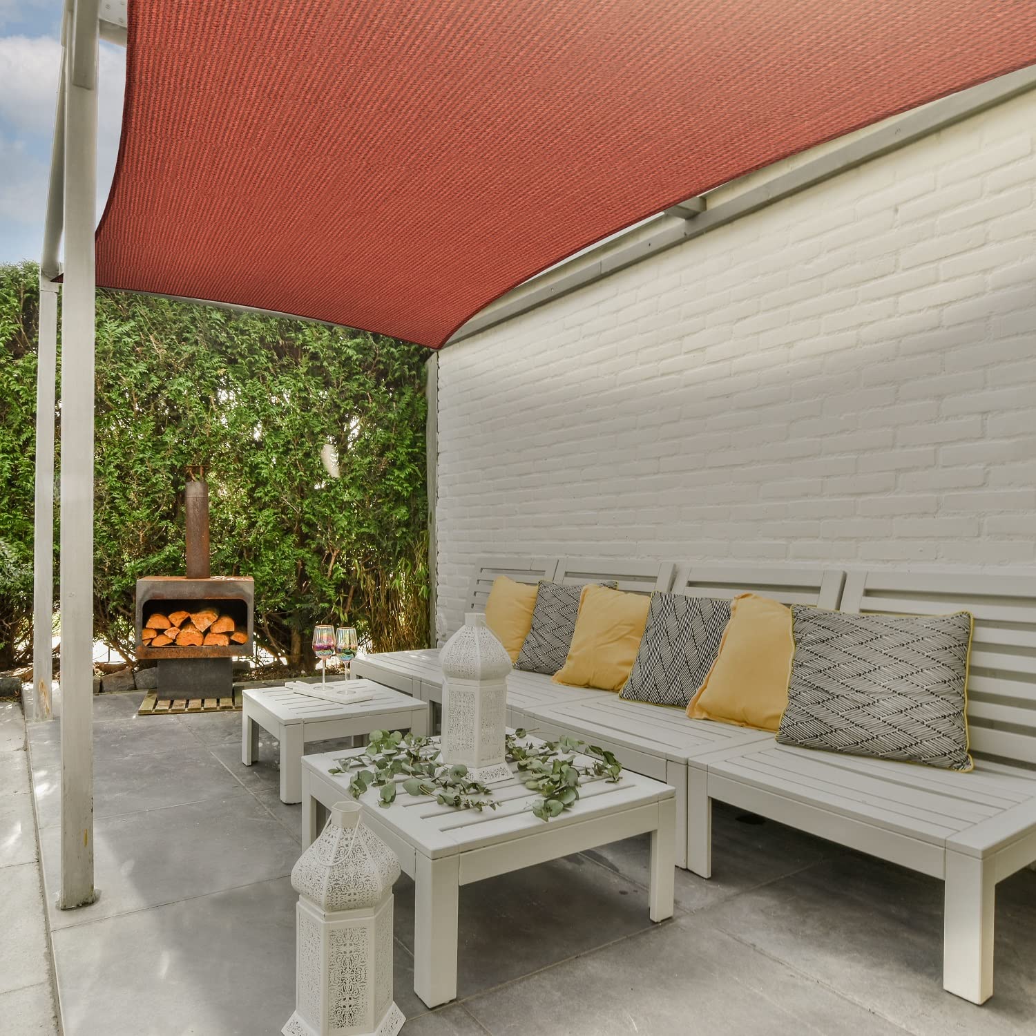 AsterOutdoor shade over outdoor dining, comfortable entertaining