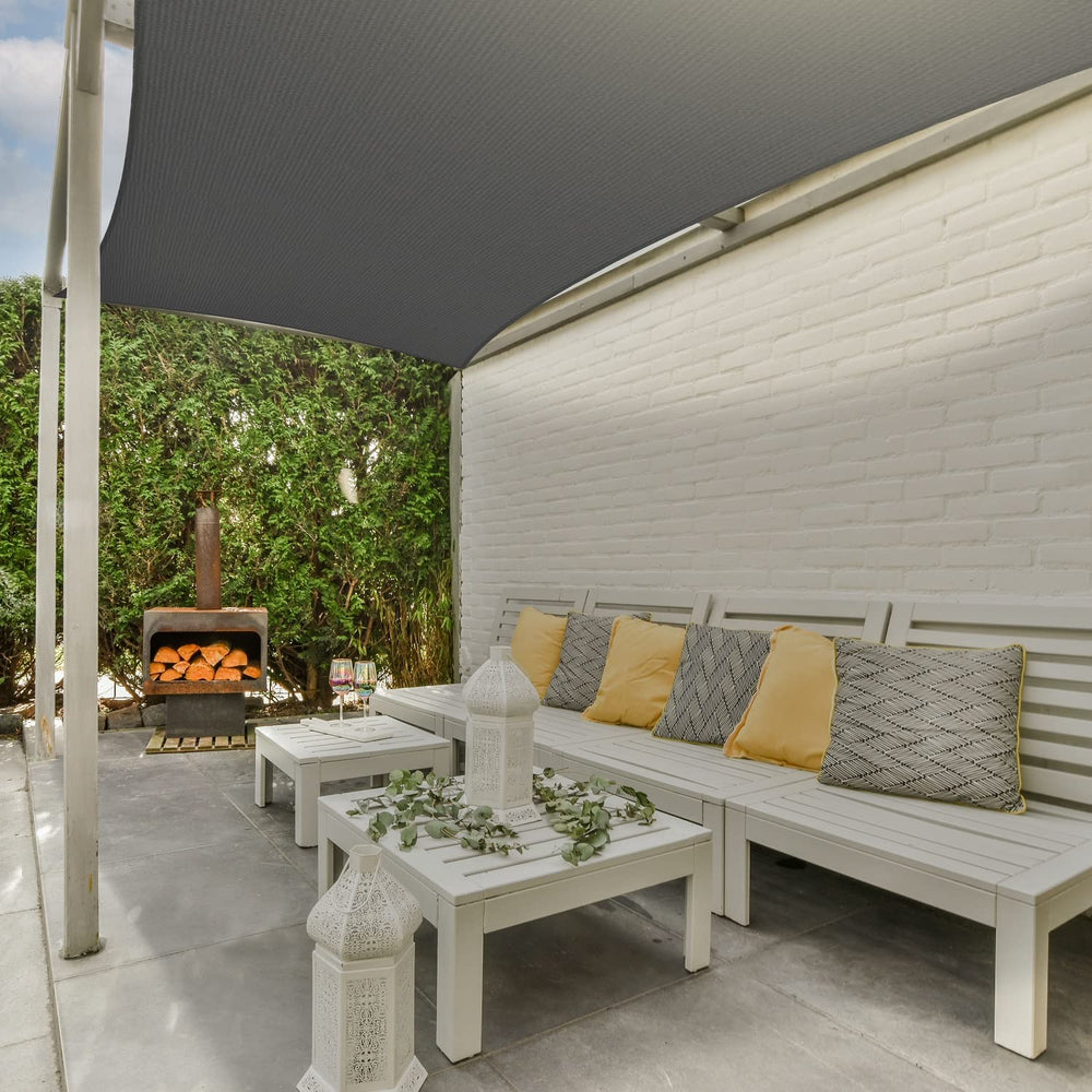 AsterOutdoor shade creating a dappled light pattern on deck to keep area bright and cool
