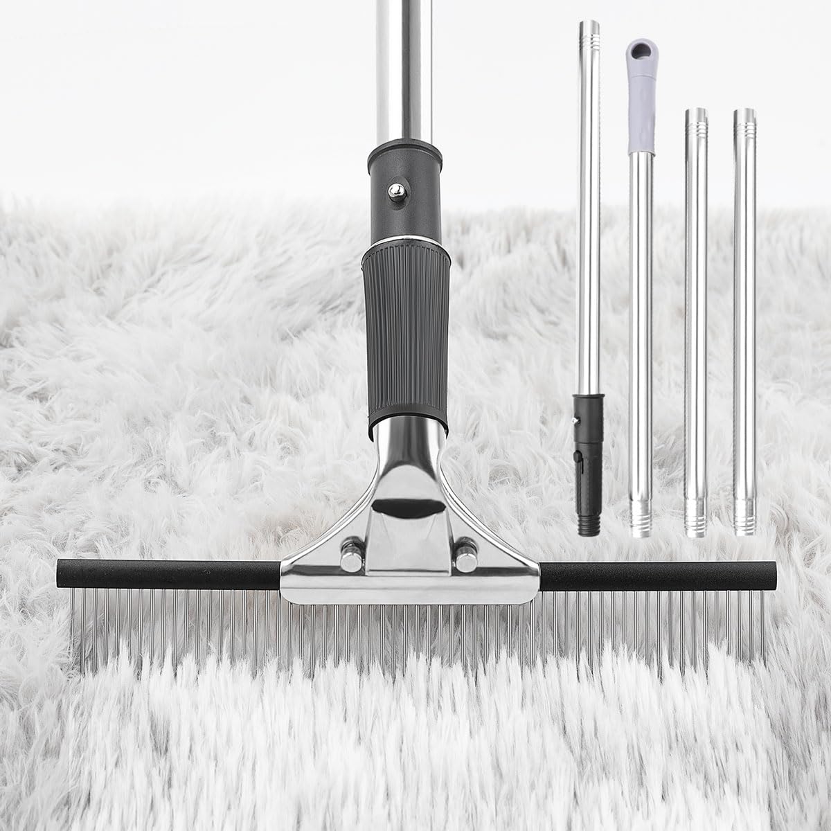 Astfys rake front view showing steel teeth and wide head for faster fluffing