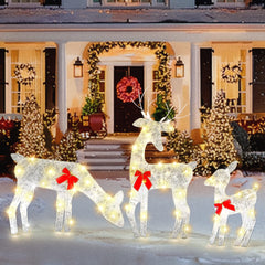 ATDAWN front view of three lighted deer family showing festive glow and curb appeal