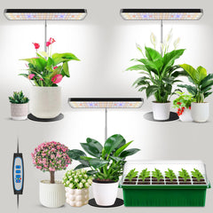 Aumtrly front view showing three black grow lights illuminating multiple plants for uniform growth