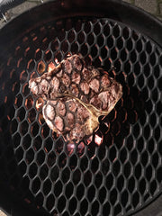 Aura Outdoor Products steak with sear marks from the grate highlighting superior searing benefit