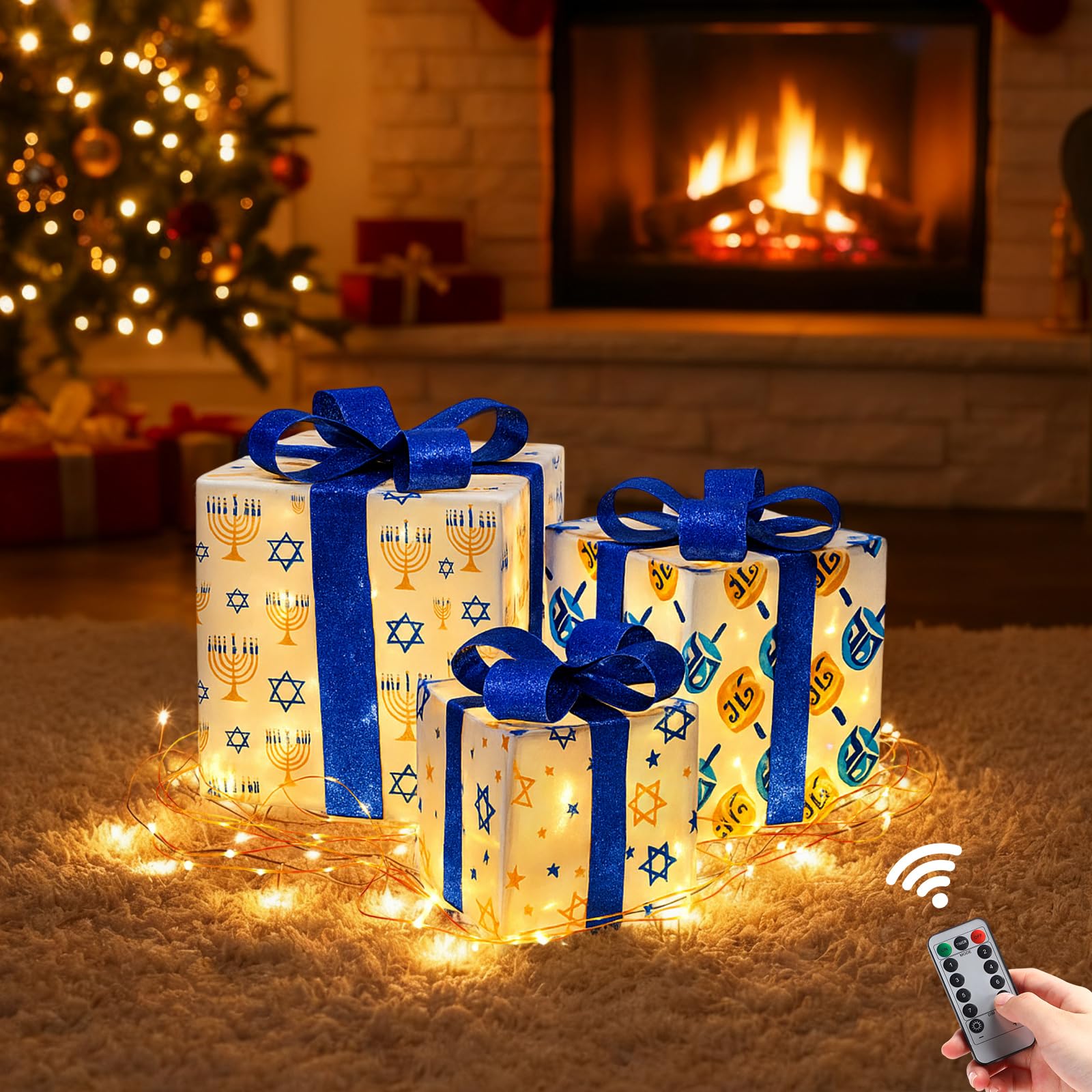 Aurelema front view of three lit gift boxes showing festive presentation and warm glow