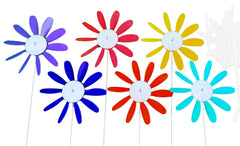 Austin Planter Beloit Plastics front view of six colorful spinning daisies showing vibrant garden decor benefit