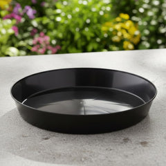 Austin Planter in-use with large pot catching water runoff, keeps floors clean and dry
