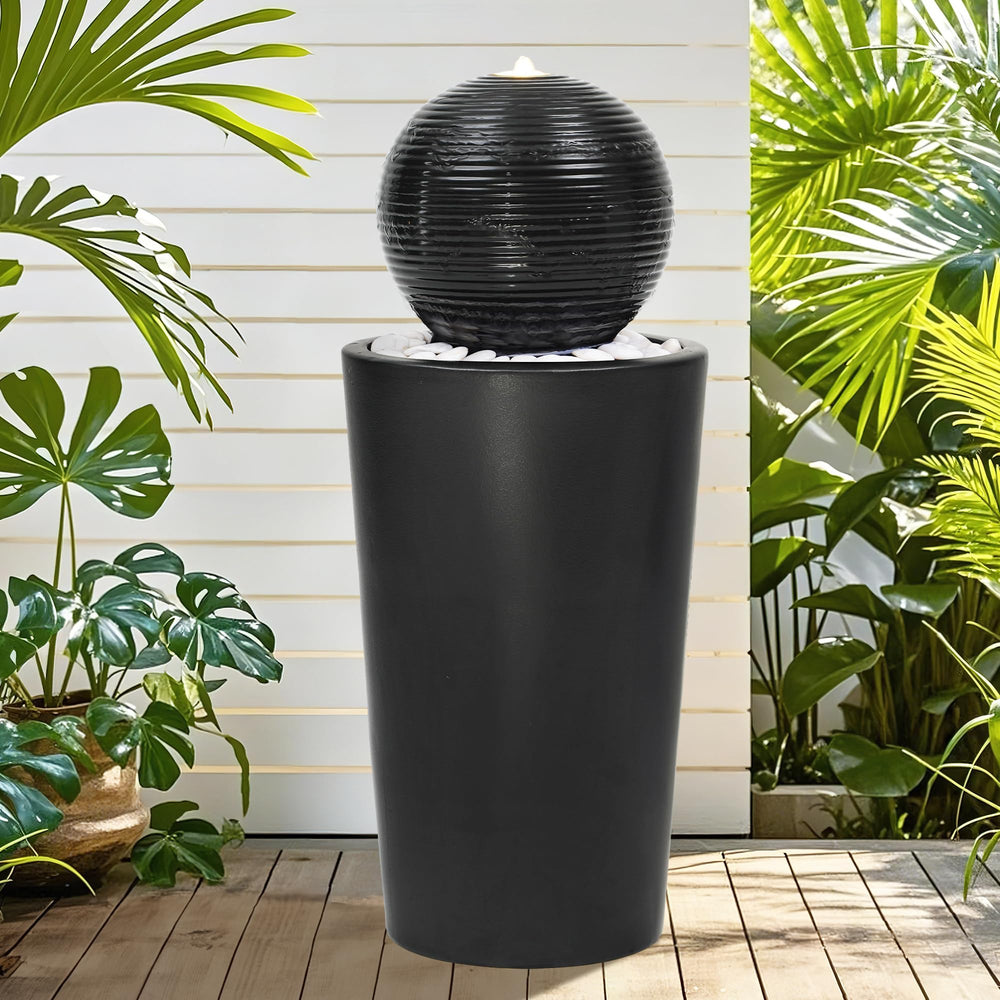 AUTO DAYA front view of ceramic sphere fountain shows modern focal point and calming water