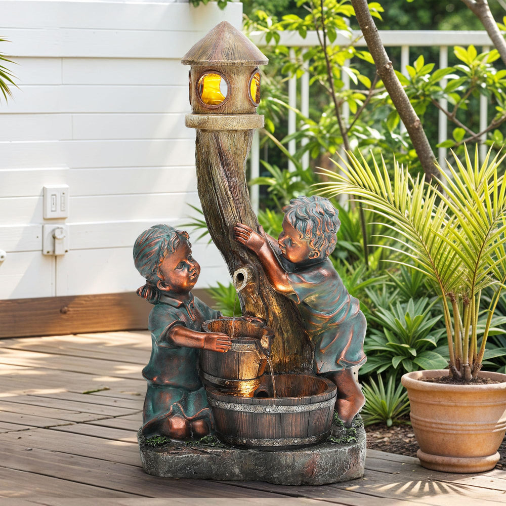 AUTO DAYA front view of boy and girl fountain showcasing focal charm and calming water