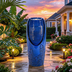 AUTO DAYA warm LED-lit fountain at dusk, creates cozy outdoor mood lighting