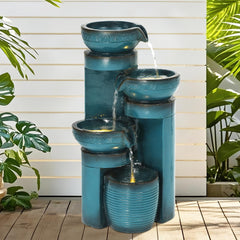 AUTO DAYA fountain lit by warm LEDs at night creating cozy outdoor ambiance