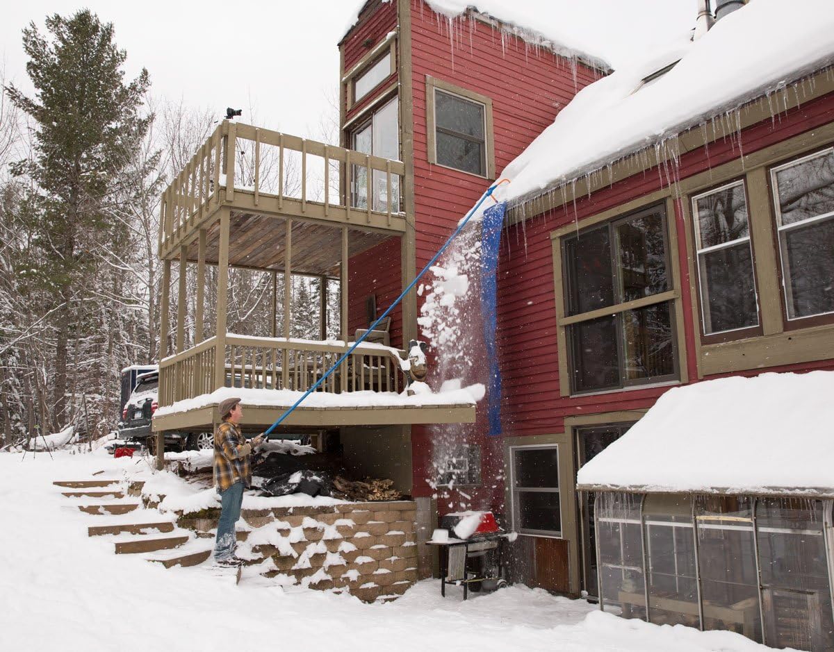 Avalanche! extension kit in use on snowy roof illustrating safer high-eave snow clearing