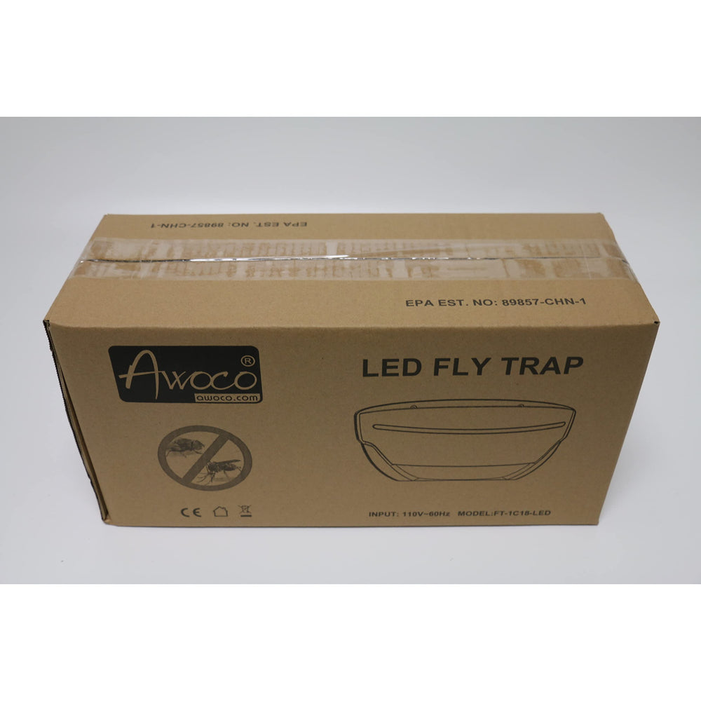Awoco label and specs plate showing voltage range and warranty details