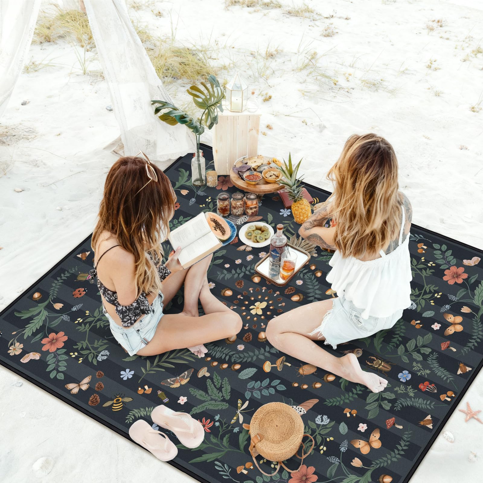 awufncksn beach scene showing sandproof backing and easy clean benefit