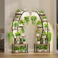 BACEKOLL plant stand styled in living room with potted plants, creates vertical garden focal point
