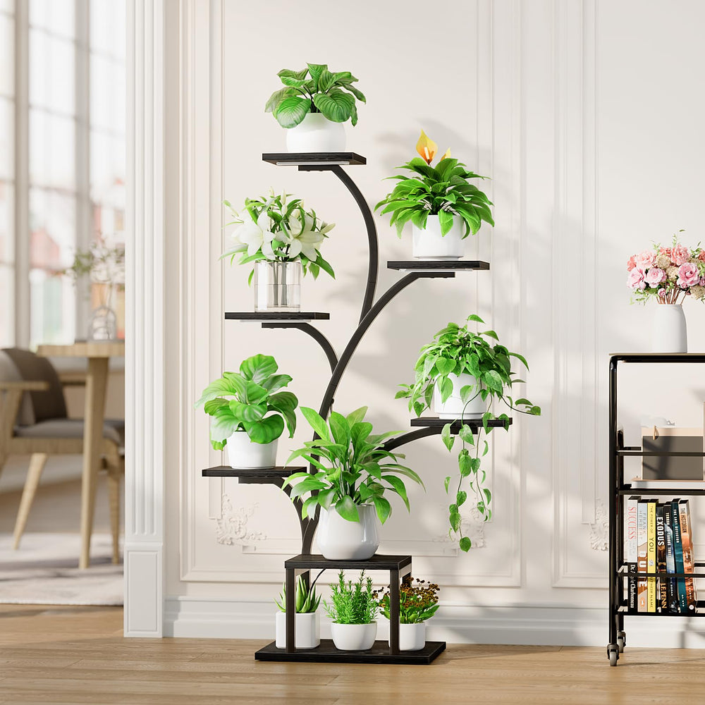 BACEKOLL plant stand beside person to show 49-inch scale and easy room fit