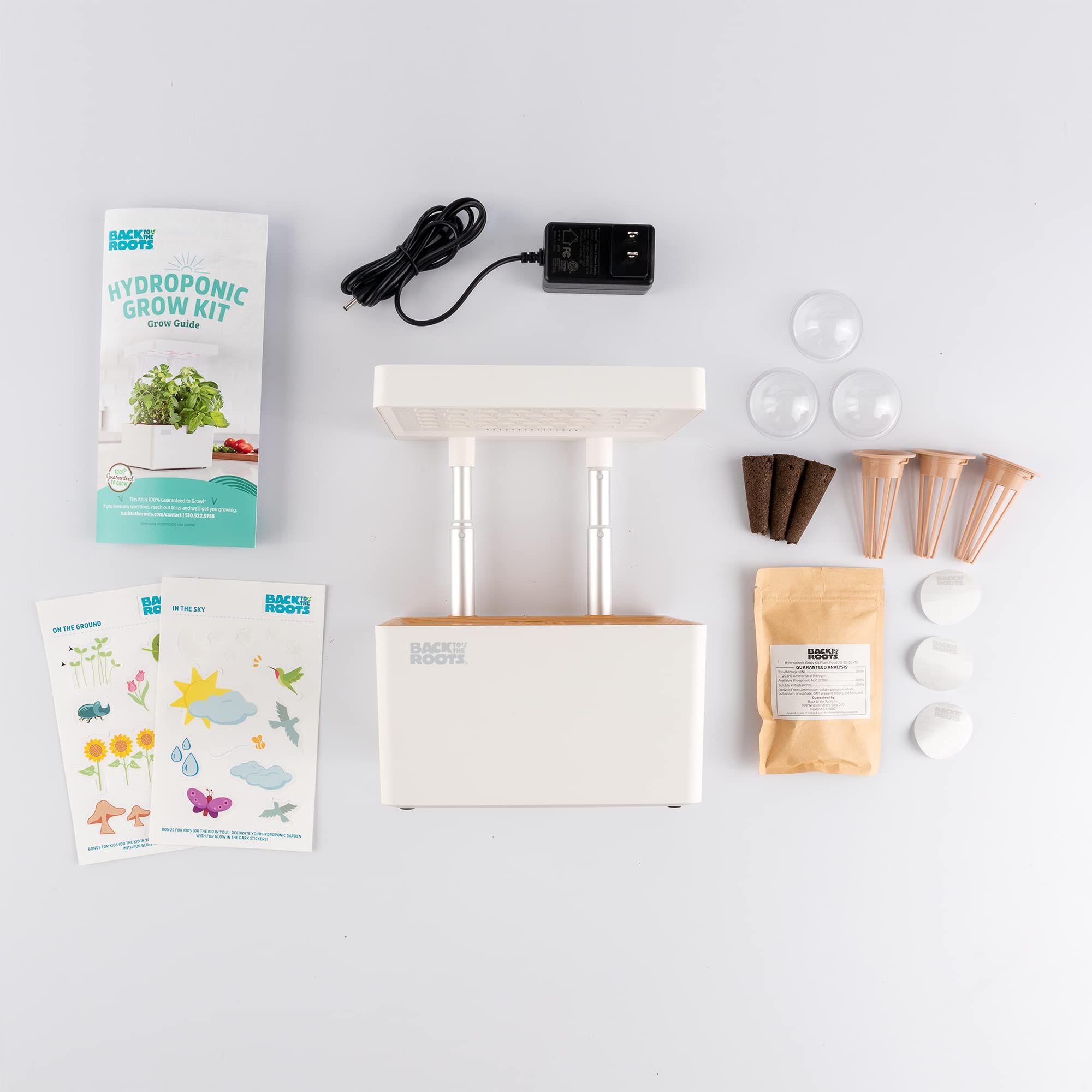 Back to the Roots on a kitchen counter with growing herbs showing fresh harvest benefit