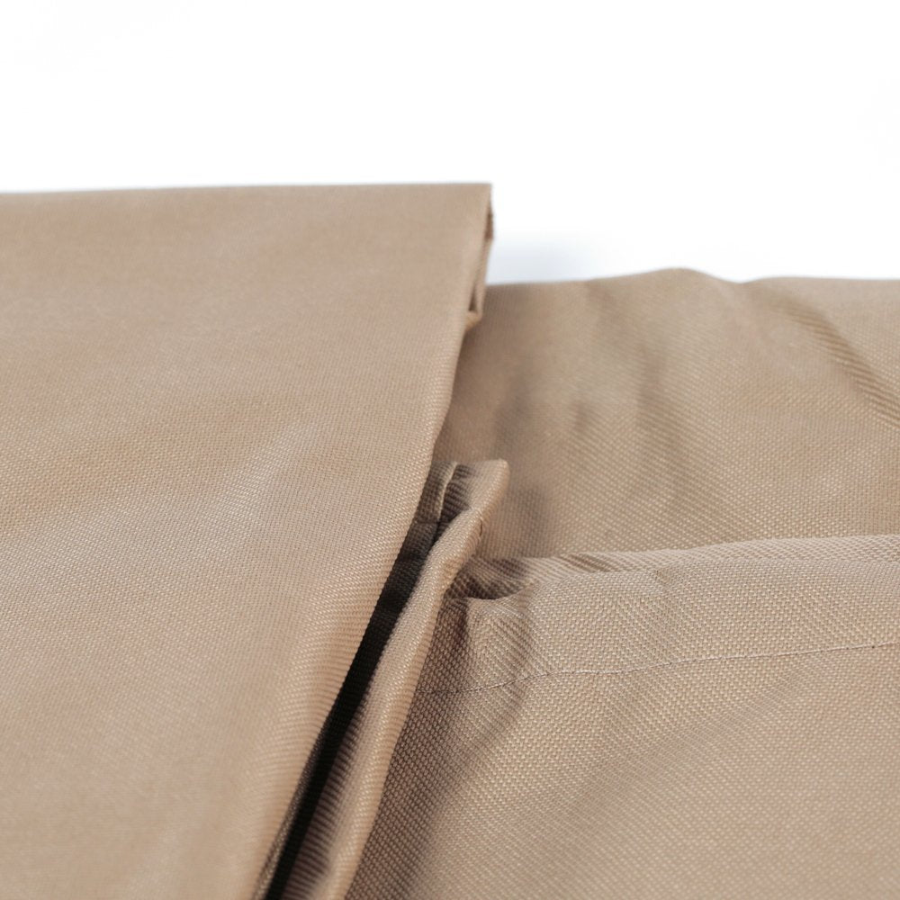 BALI OUTDOORS folded cover stored compactly with warranty tag visible