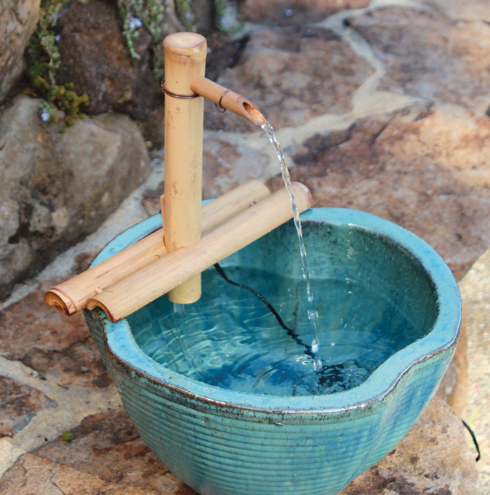 Bamboo Accents installed in a patio basin showing ambient sound benefit