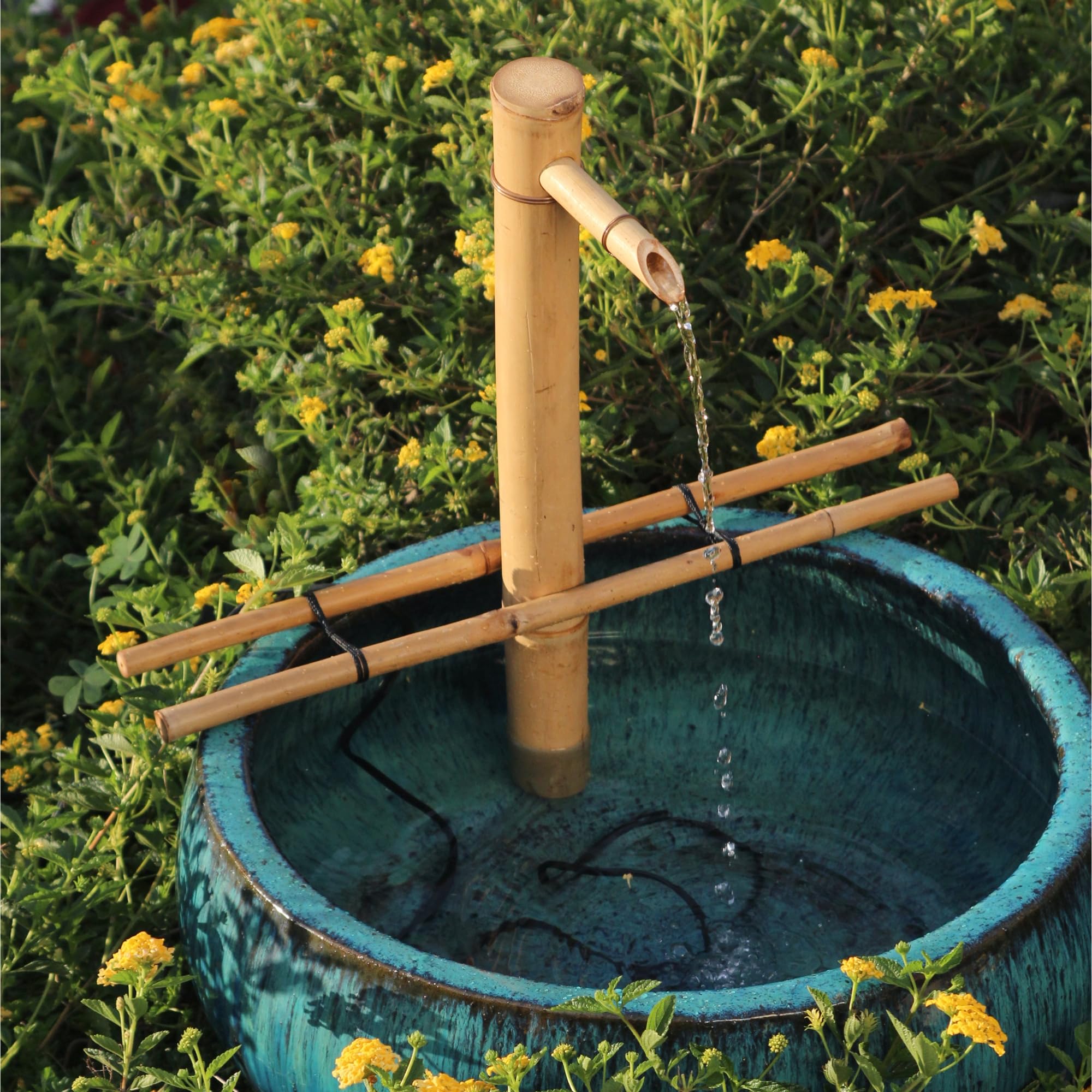 Bamboo Accents installed in a garden bowl on a patio creating tranquil focal point