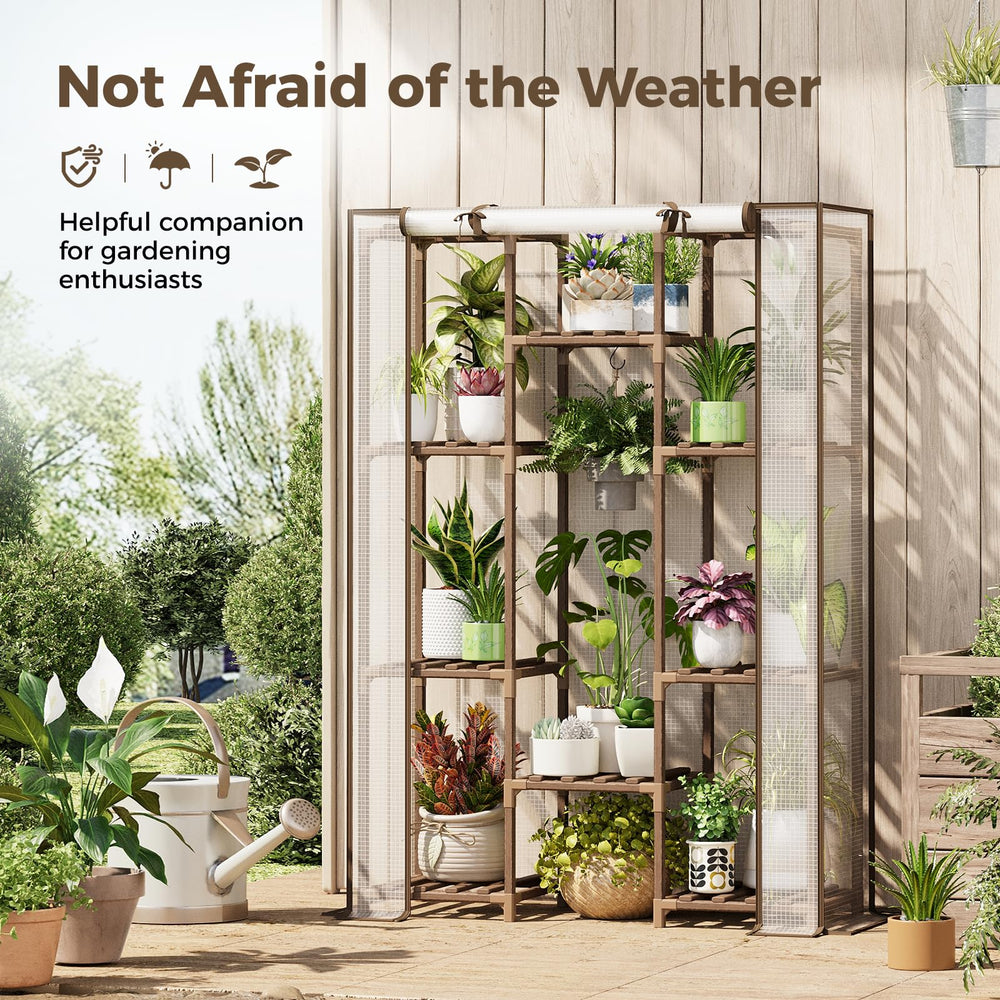 Bamworld greenhouse in use on balcony organizing herbs and potted plants neatly
