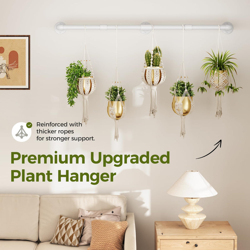 Bamworld hanging several plants along the rod to maximize vertical garden area
