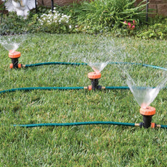 Bandwagon front view of assembled three-head sprinkler showing coverage and easy setup benefit