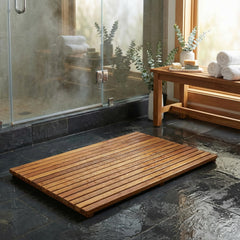 Bare Decor teak mat placed at shower exit offering slip-resistant surface