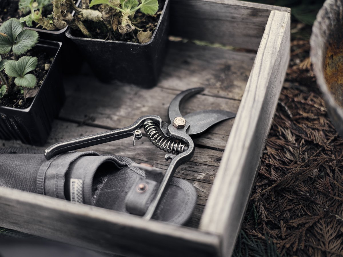 Barebones pruner lifestyle garden table showing elegant tool in a workspace
