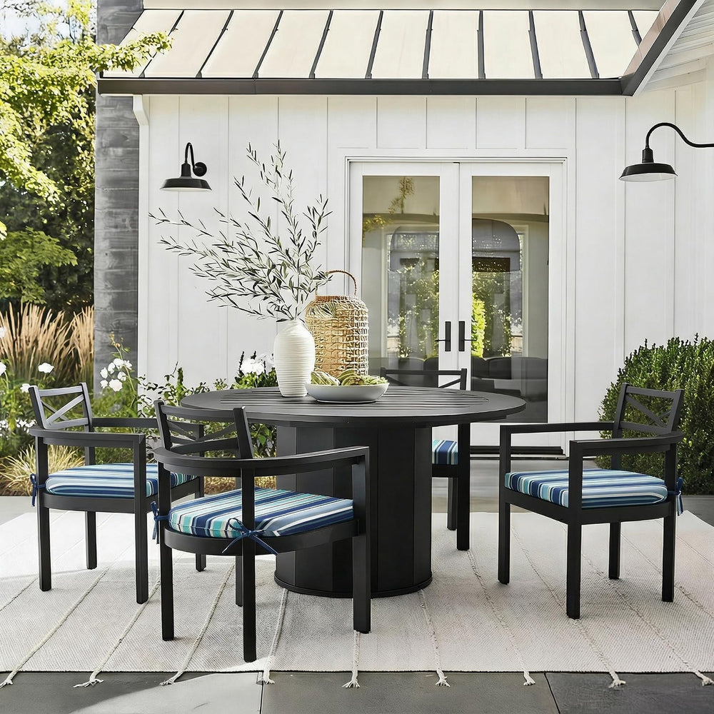Basic Beyond cushions arranged on backyard chairs showing coordinated style benefit