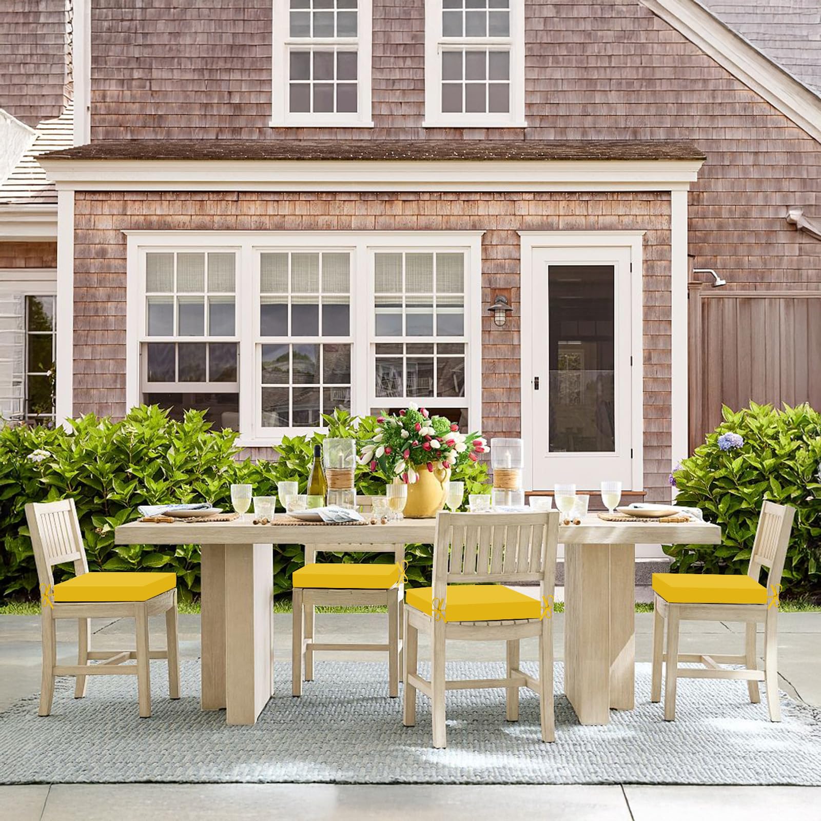 Basic Beyond set of cushions in a backyard patio scene showing style and comfort benefit